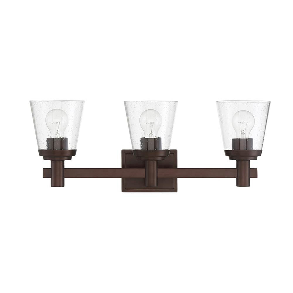 Sunset Lighting Riella 3-Light MB Vanity w/ Clear Seeded Glass Provincial Bronze F24103-64