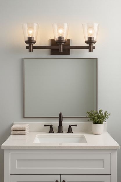 Sunset Lighting Riella 3-Light MB Vanity w/ Clear Seeded Glass Provincial Bronze F24103-64