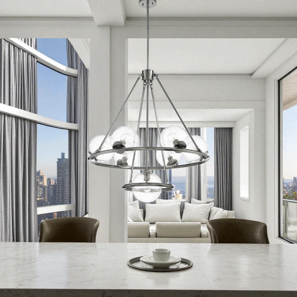 Sunset Lighting F26117-57 Messier 7 Light Chandelier - Clear Seeded Glass Globe - Dimmable - Antique Gunmetal Finish
