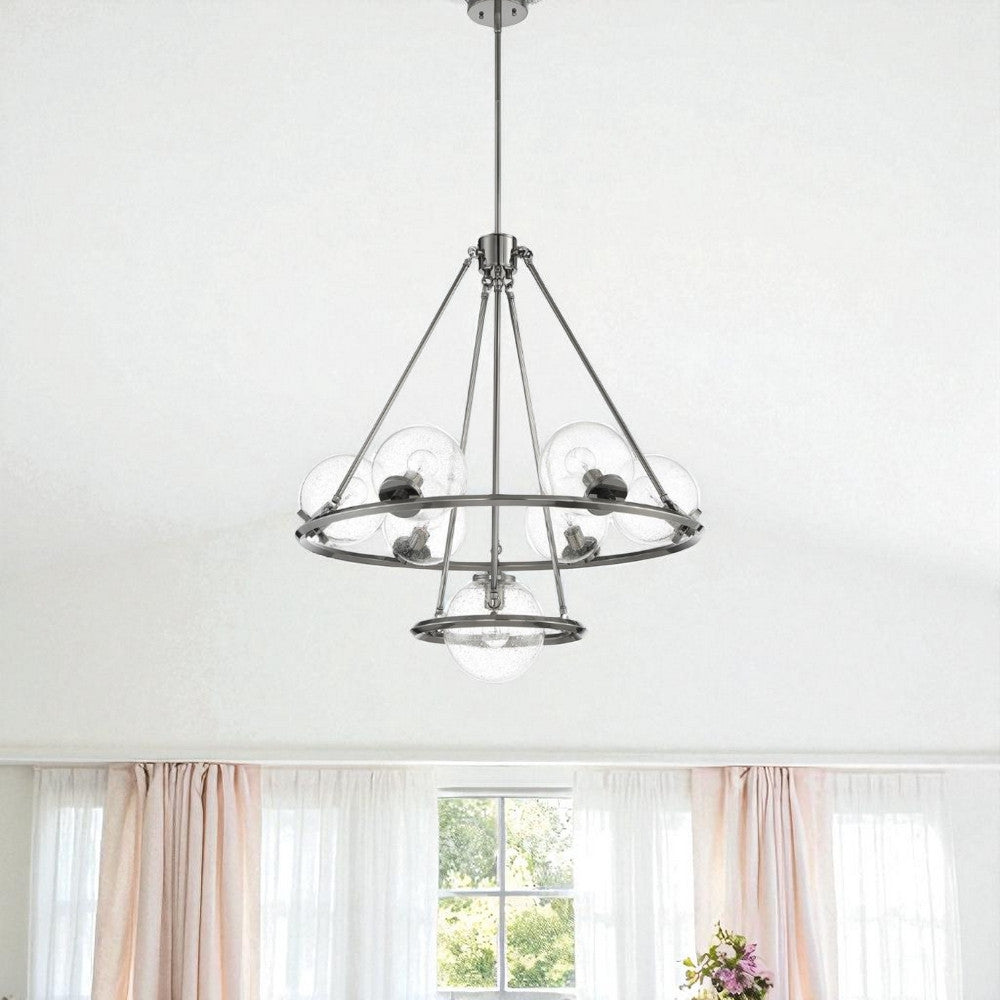 Sunset Lighting F26117-57 Messier 7 Light Chandelier - Clear Seeded Glass Globe - Dimmable - Antique Gunmetal Finish