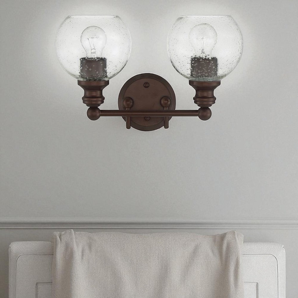 Sunset Lighting Oriana 2-Light Mb Vanity Clear Seeded Glass Provincial Bronze F29012-64