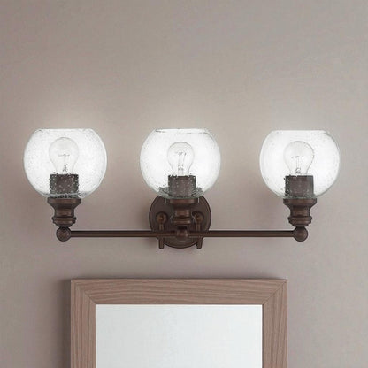 Sunset 3 Lt Vanity With Clear Seeded Glass Globe Shades - Provincial Bronze F29013-64