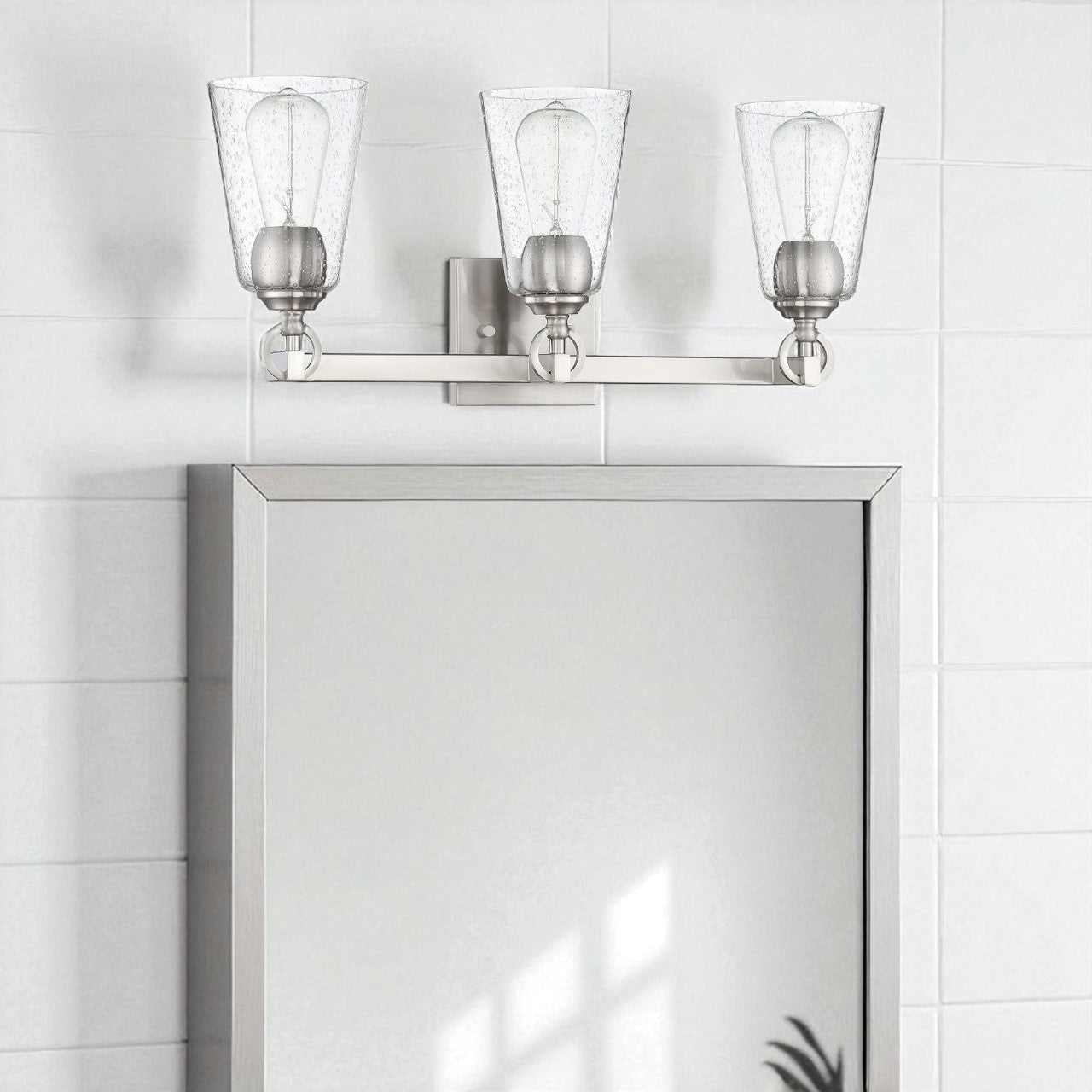 Sunset Lighting Arden 3-Light Vanity Clear Seedy Steel Round Glass 100W w/ Bright Satin Nickel Finish F7223-80