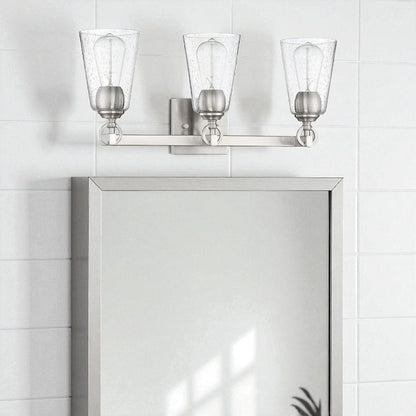 Sunset Lighting Arden 3-Light Vanity Clear Seedy Steel Round Glass 100W w/ Bright Satin Nickel Finish F7223-80